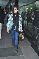 Twinkle Khanna snapped at the airport as they arrive from Casablanca on 16th Dec 2013
